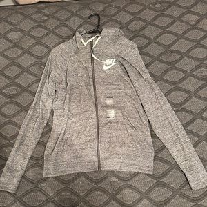Sized large, women’s Nike just do it jacket